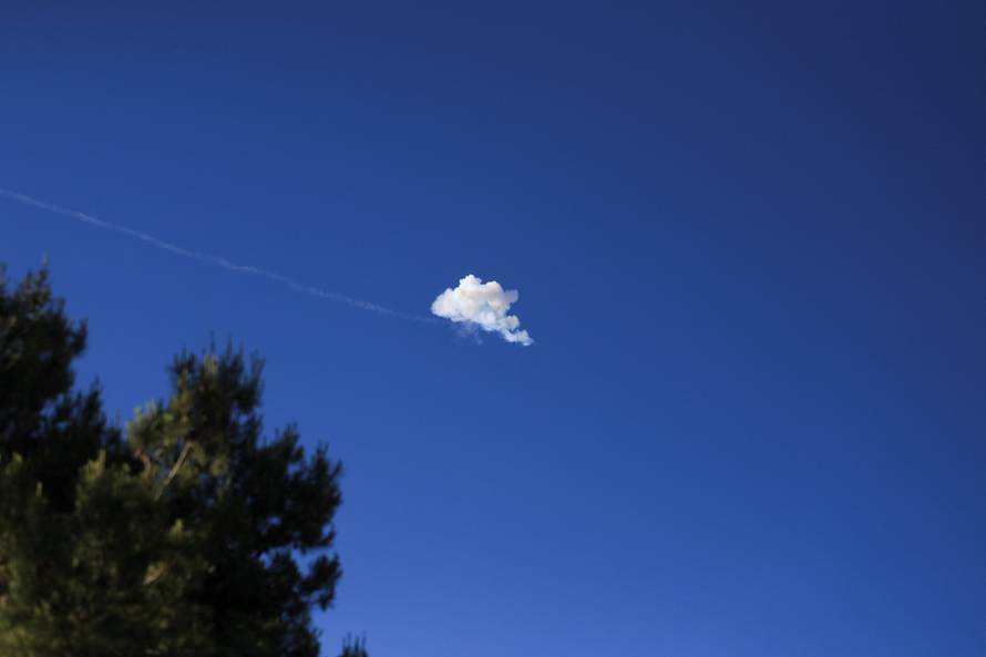 Smoke from an explosion in the sky after the Iron Dome anti-missile system intercepted an Iranian missile, as seen from Jerusalem