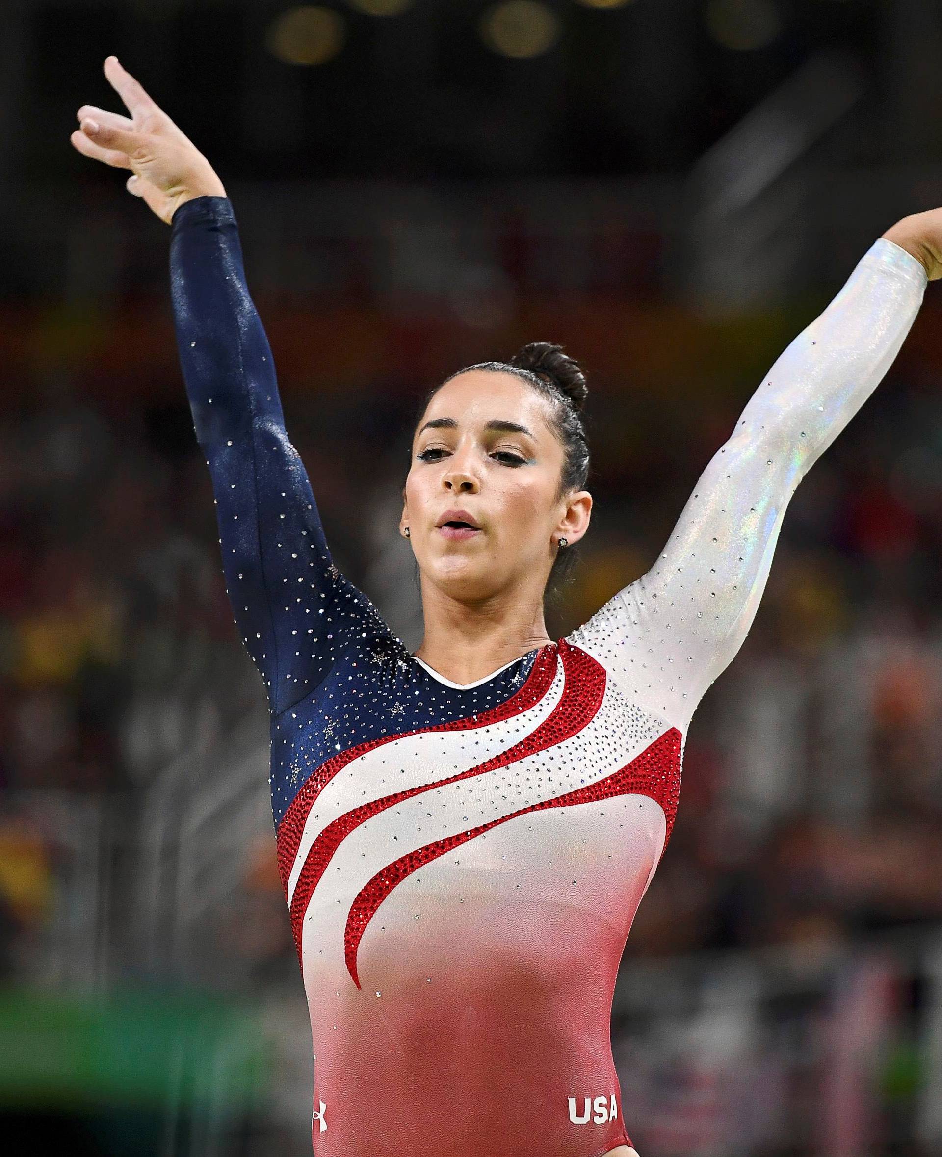 FILE PHOTO: Alexandra Raisman of USA competes on the beam during the women's team final in Artistic Gymnastics at the 2016 Rio Olympics in Rio de Janeiro