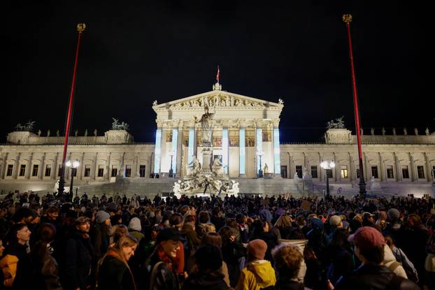 People attend a protest against Freedom Party after general elections in Vienna