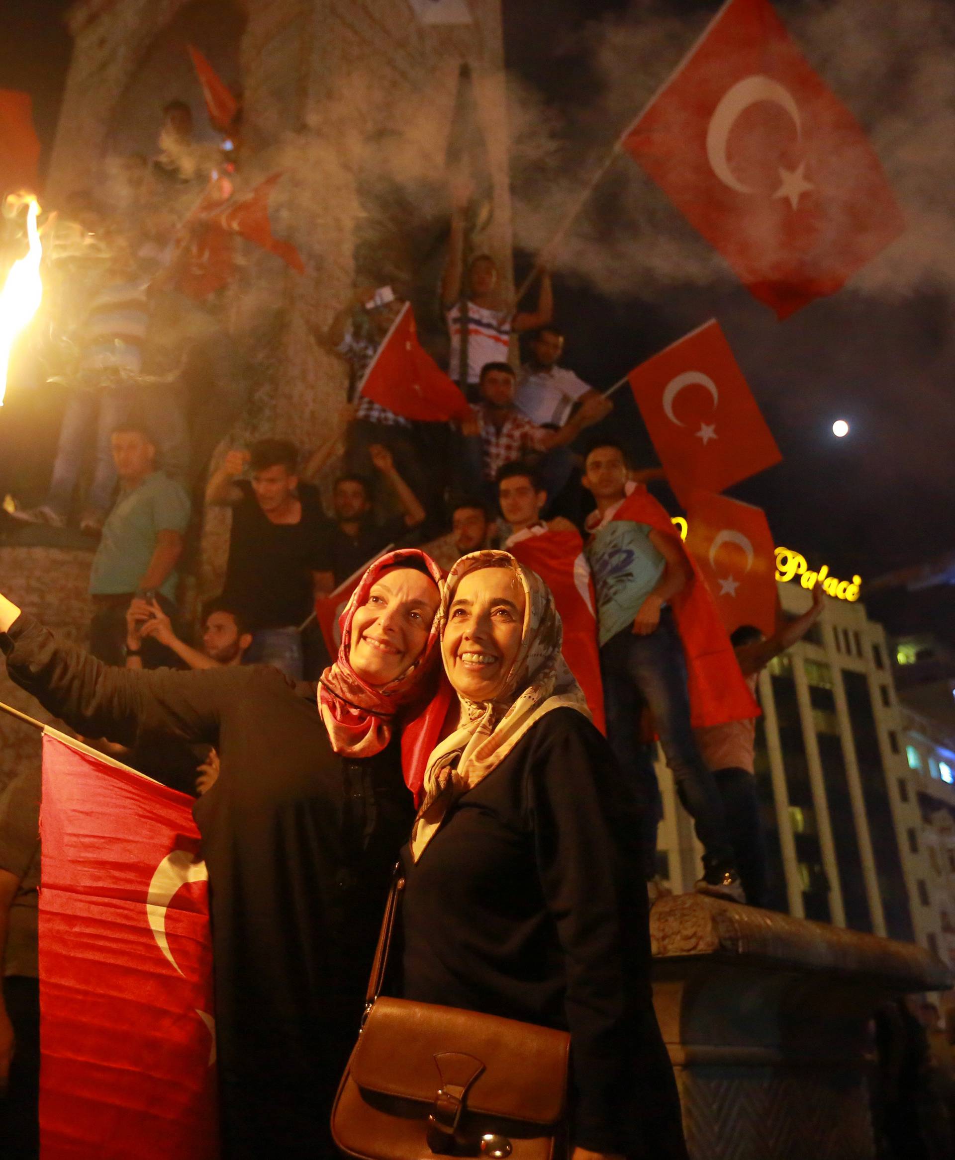 Supporters of Turkish President Erdogan gather at Taksim Square in central Istanbul