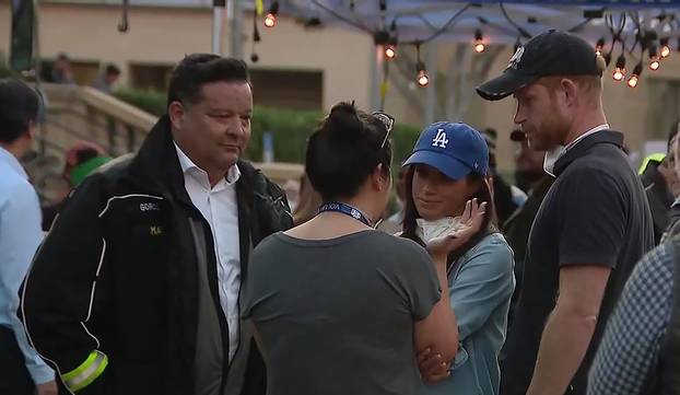 Prince Harry and Meghan Markle at the Pasadena Convention Center meeting with emergency services and victims of the Eaton fire during the Los Angeles fire