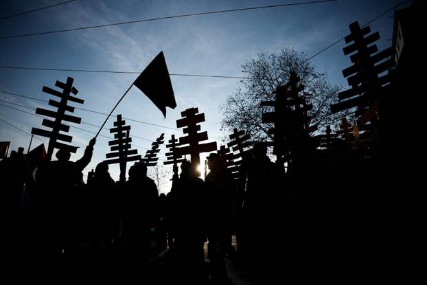 Demonstrators protest the 2026 Winter Olympics in Milan