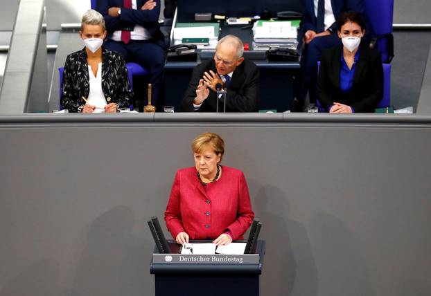 German Chancellor Angela Merkel attends a session of the Bundestag, in Berlin