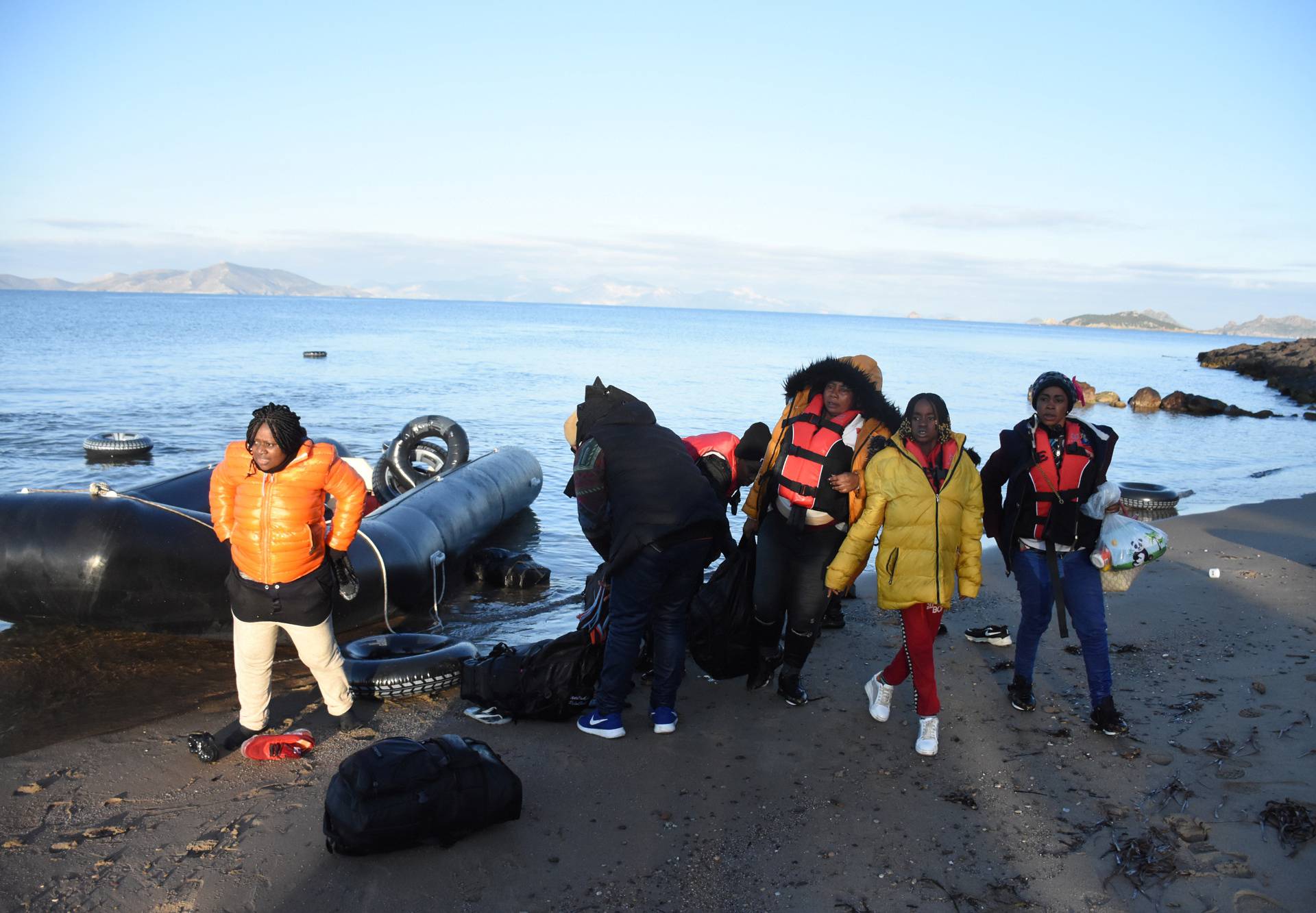 Migrants return to Turkish coastline after an unsuccessful attempt to reach the Greek island of Kos, in Bodrum