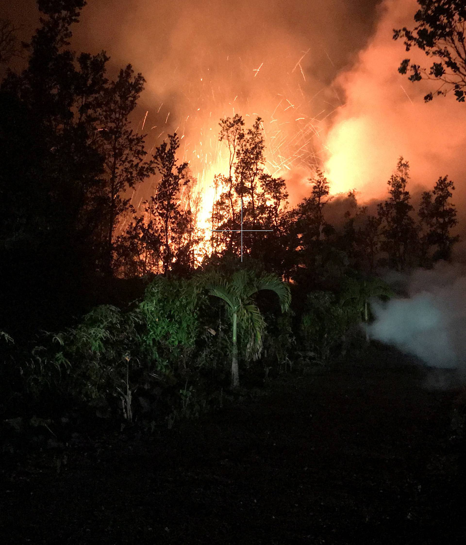 A fissure on Leilani and Kaupili Streets in the Leilani Estates subdivision caused by an eruption of the Kilauea Volcano following a series of earthquakes, in Hawaii