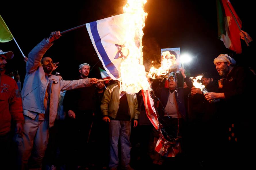 People gather after a two-week ceasefire in the Iran war was announced, in Tehran