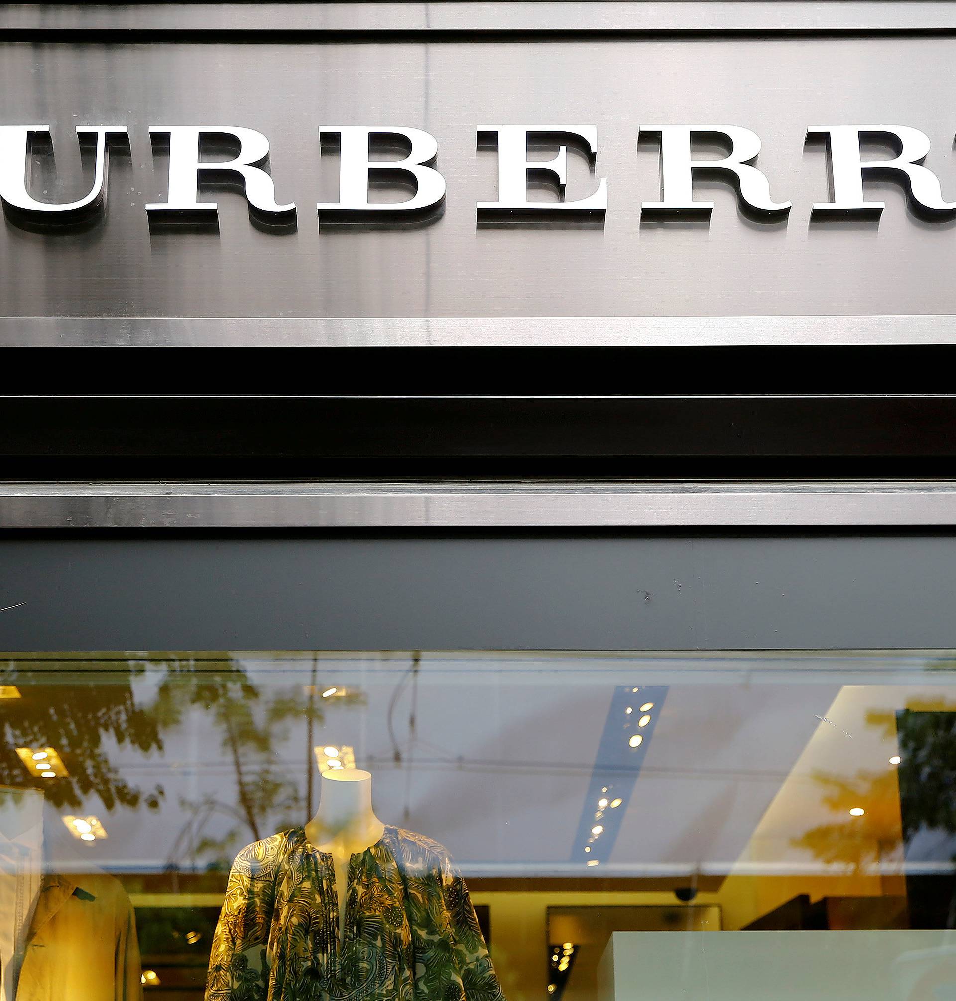 FILE PHOTO: Logo of British luxury brand Burberry is seen at a shop in Zurich