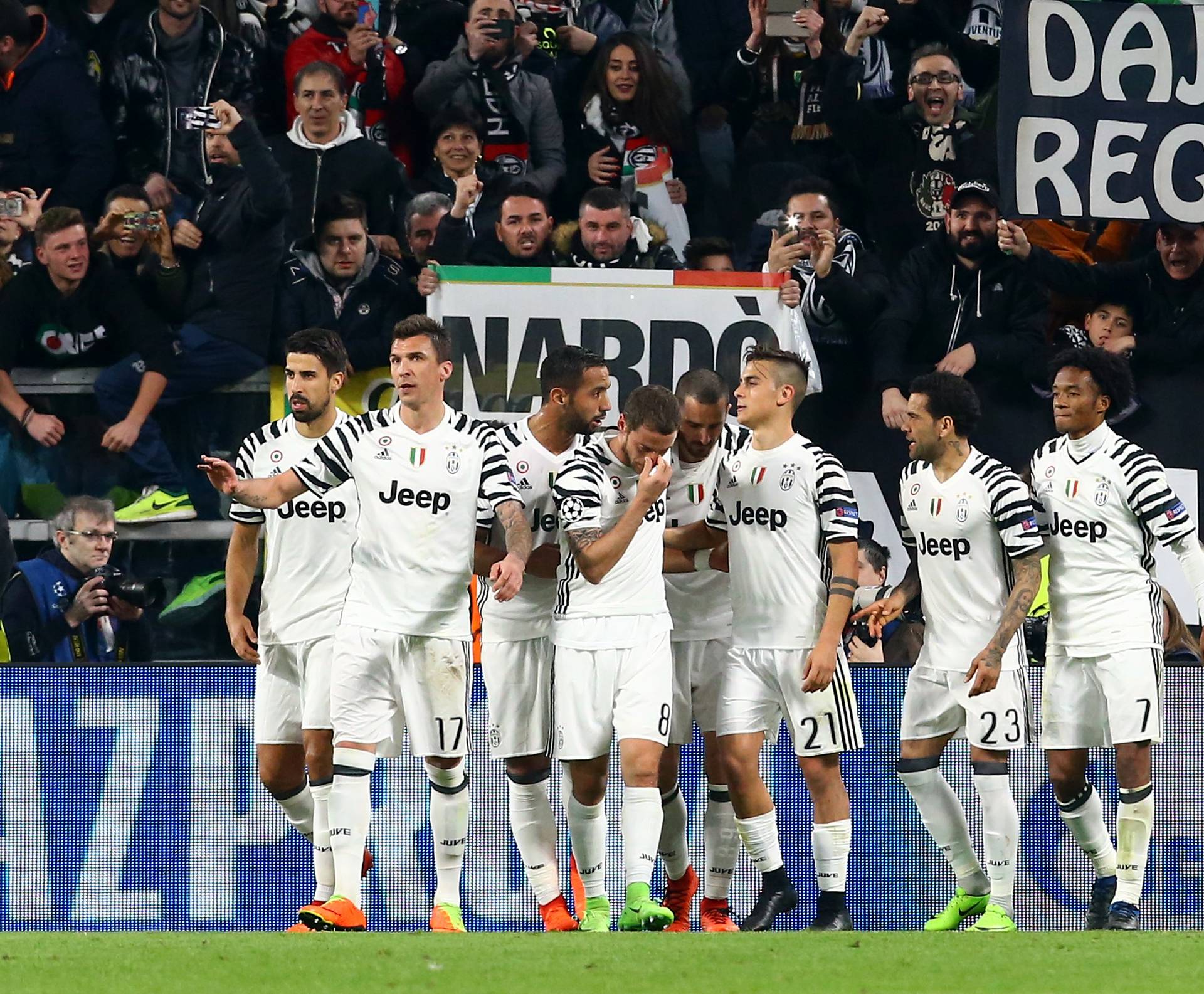 Juventus' Paulo Dybala celebrates scoring their first goal with team mates