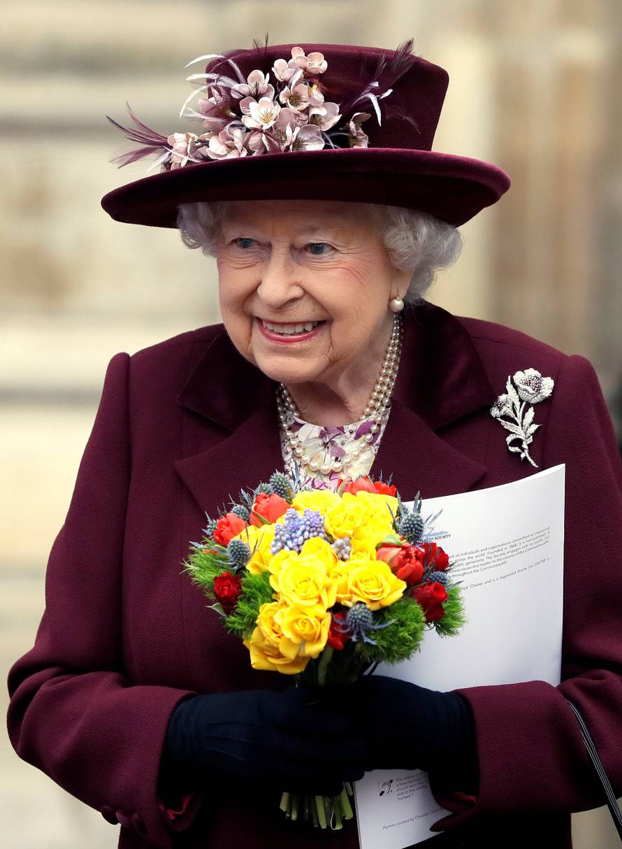 Britain's Queen Elizabeth leaves after attending the Commonwealth Service at Westminster Abbey in London