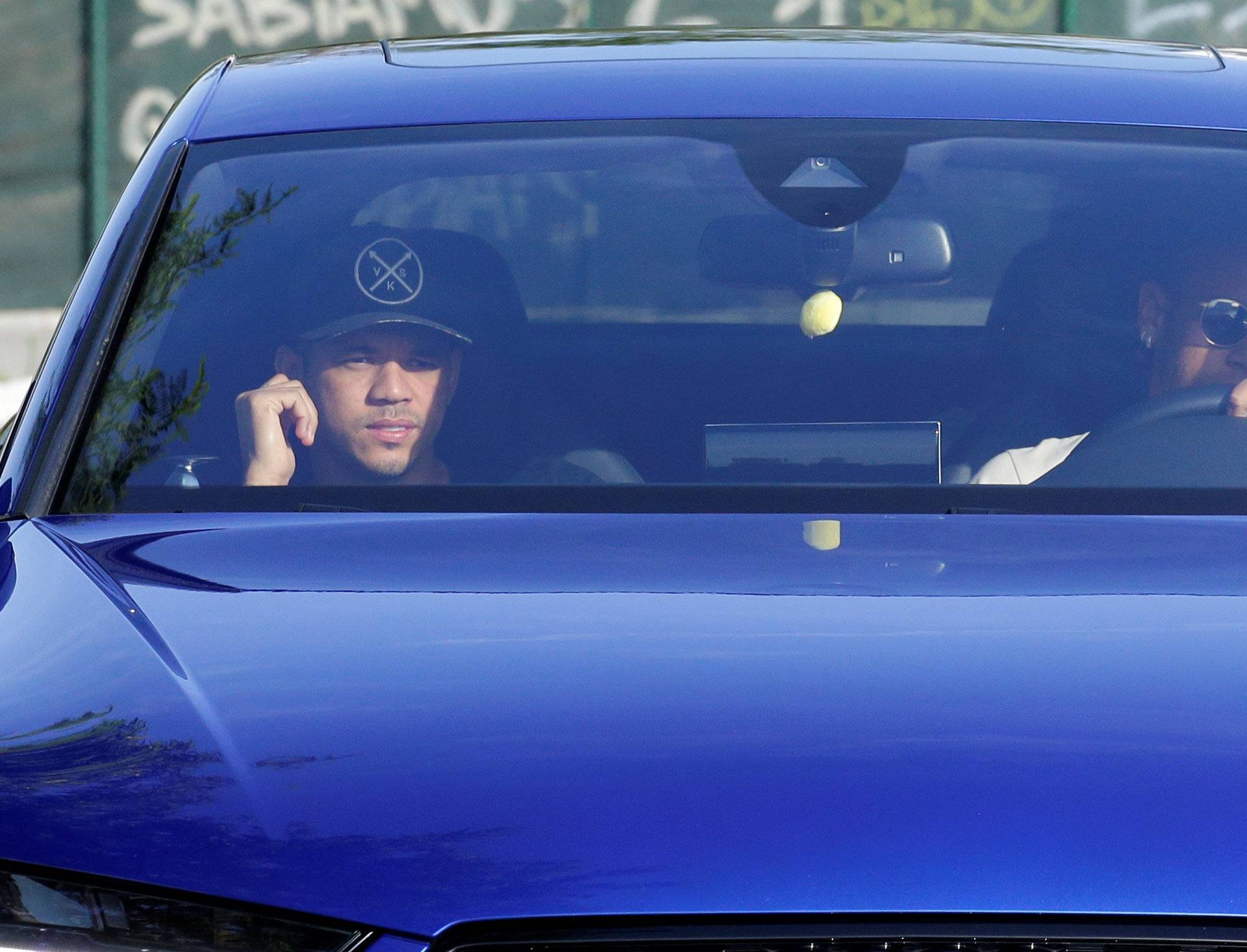 Brazilian soccer player Neymar drives to arrives to Joan Gamper training camp near Barcelona