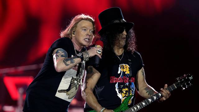 Axl Rose and Slash, lead singer and lead guitarist of U.S. rock band Guns N' Roses, perform during their "Not in This Lifetime... Tour" at the du Arena in Abu Dhabi