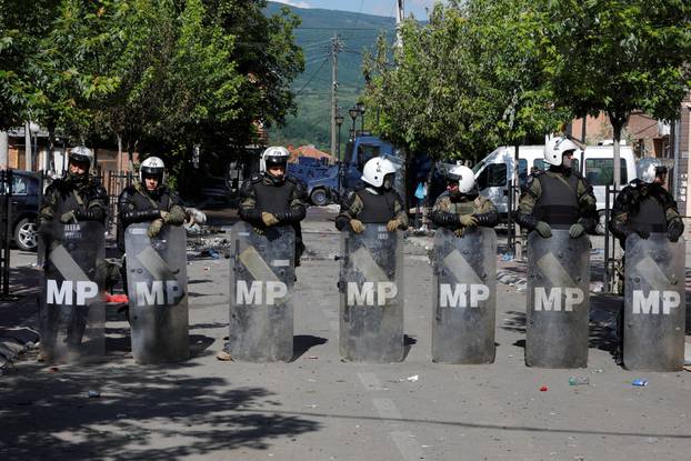 Polish Kosovo Force (KFOR) soldiers guard a municipal office in Zvecan