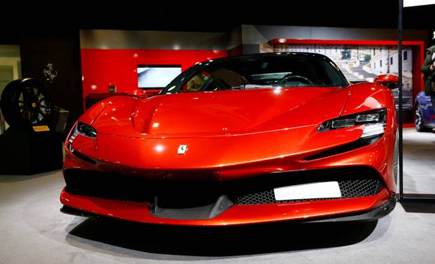 FILE PHOTO: A Ferrari SF90 Stradale hybrid sports car is seen at the Auto Zurich Car Show in Zurich