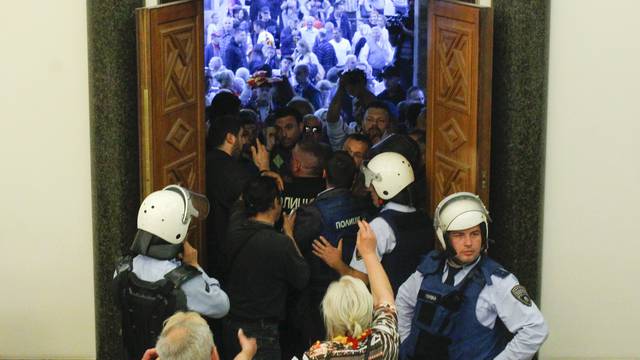 Protesters entered Macedonia's parliament after the governing Social Democrats and ethnic Albanian parties voted to elect an Albanian as parliament speaker in Skopje