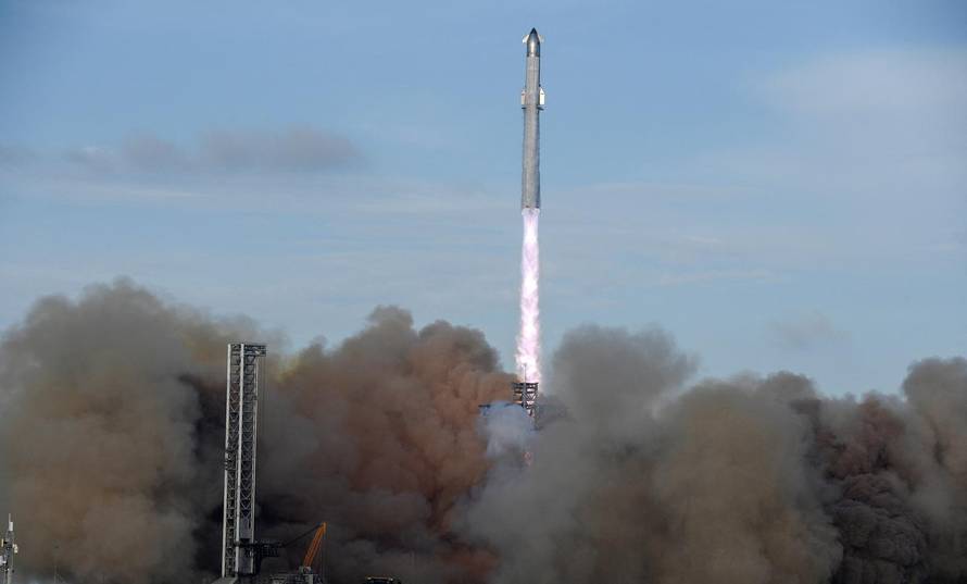 A SpaceX Super Heavy booster carrying the Starship spacecraft lifts off on its 10th test flight
