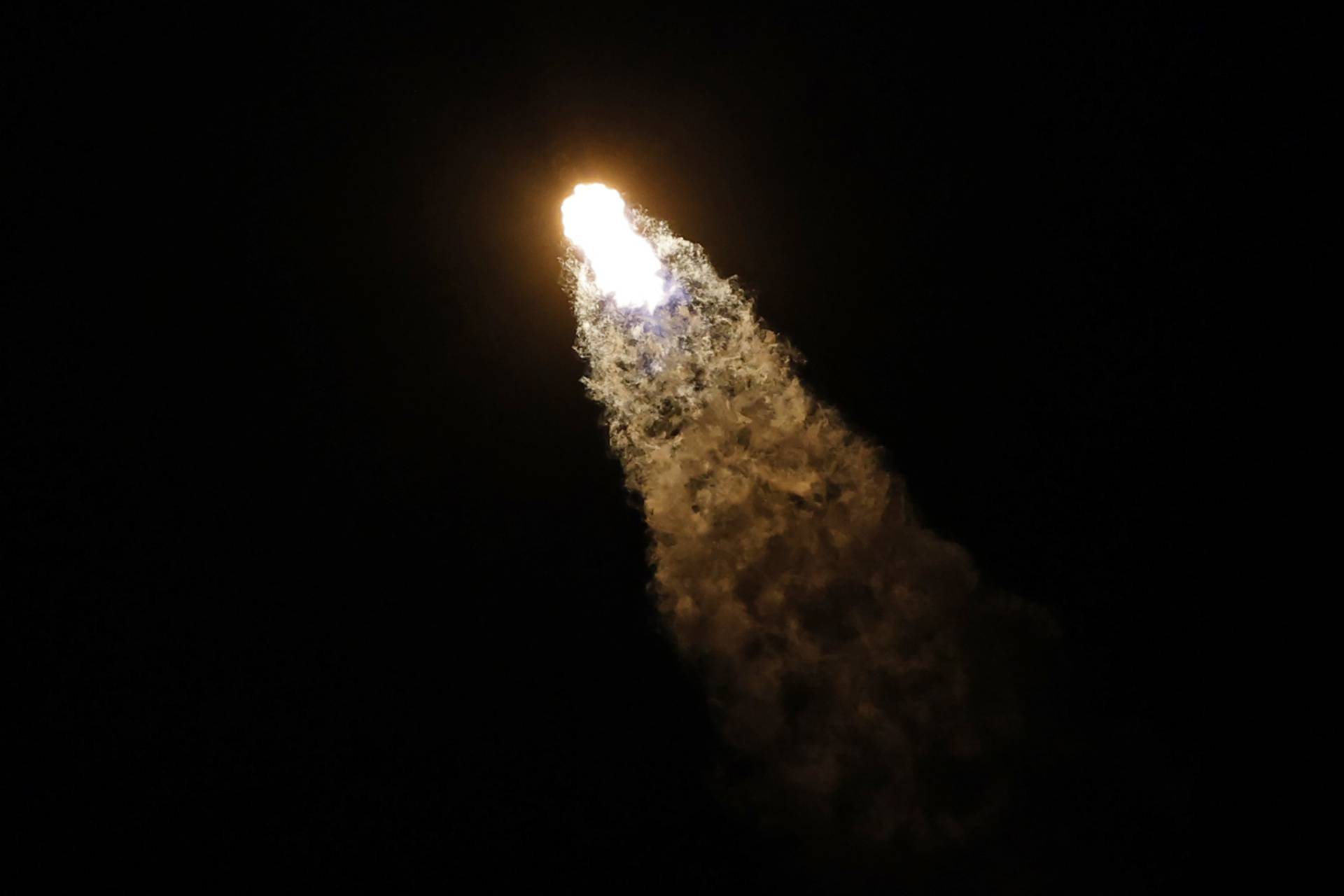 The Inspiration 4 civilian crew aboard a SpaceX Falcon 9 rocket launches from Kennedy Space Center