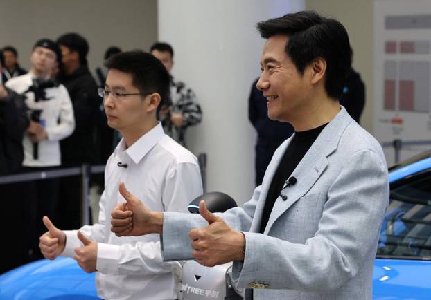 Chinese tech giant Xiaomi unveils new generation of SU7 electric vehicle, in Beijing