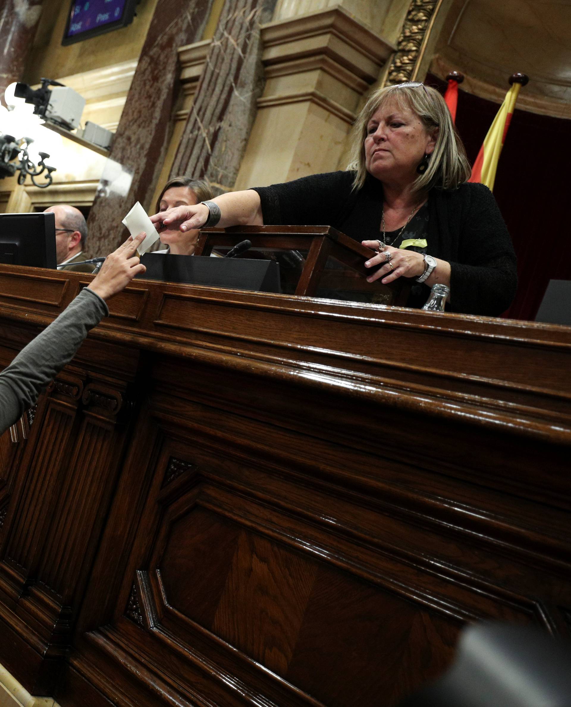 Leftist party CUP leader Anna Gabriel casts her ballot during a vote on independence from Spain during a plenary session at the Catalan regional Parliament in Barcelona