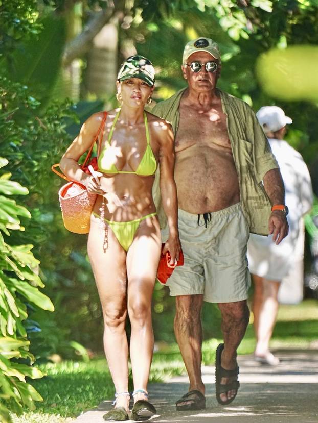 *PREMIUM-EXCLUSIVE* Rita Ora stuns in a neon bikini during Gold Coast stroll with her dad