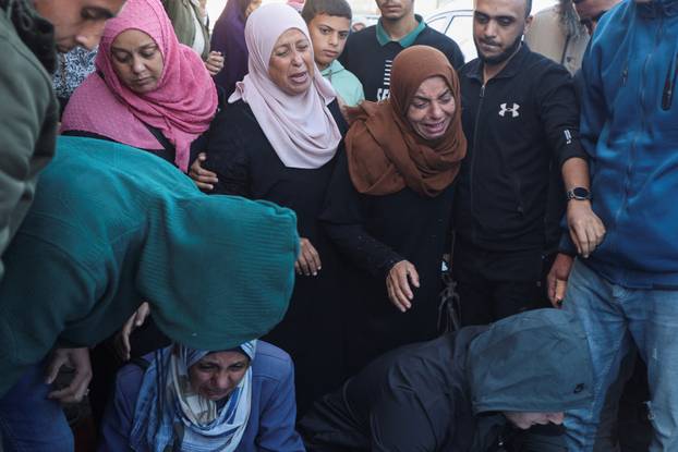 Gazans mourn loved ones killed in Israeli strikes
