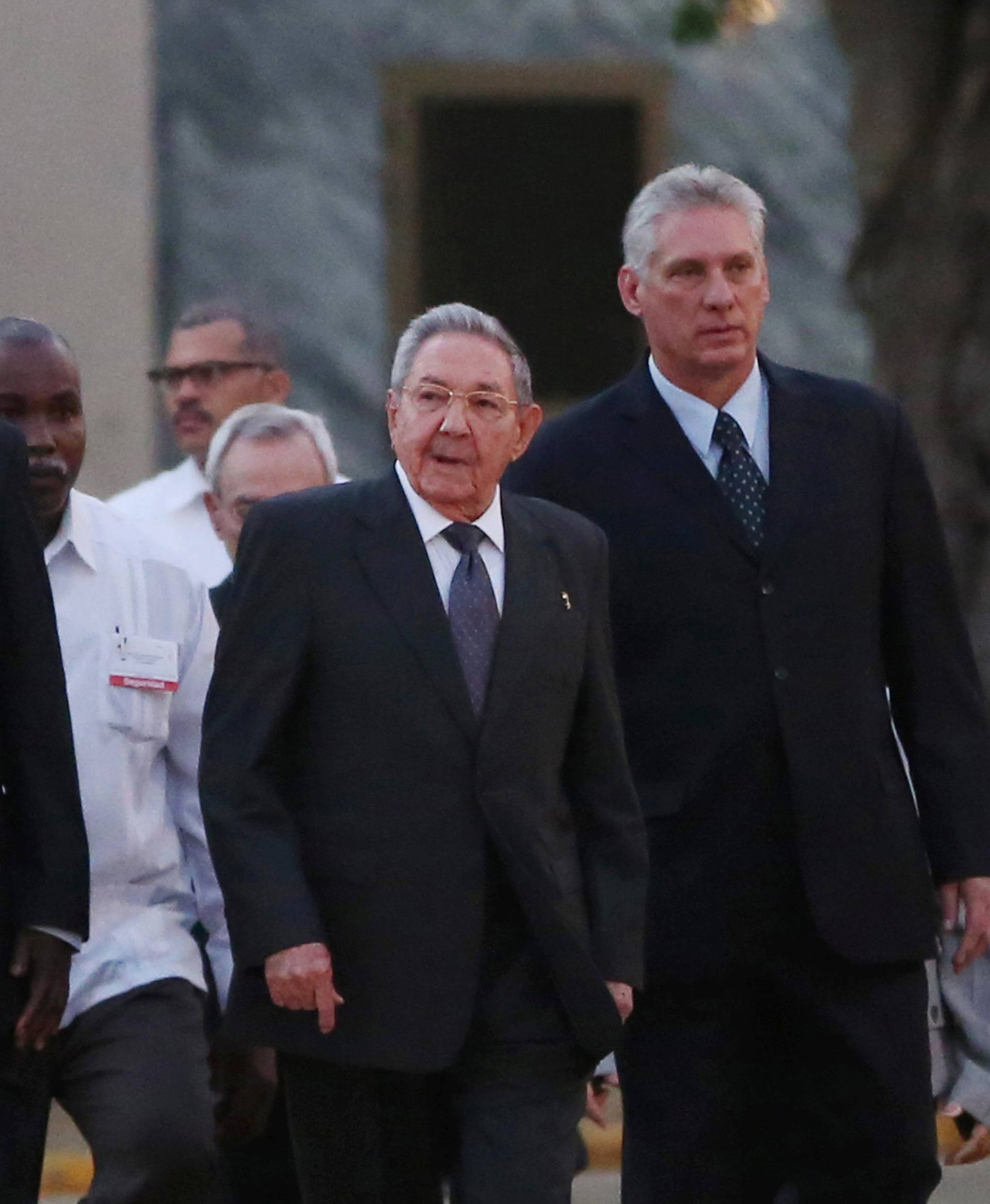 Cuba's President Raul Castro arrives for a ceremony to inaugurate a replica of New York's statue of Cuba's independence hero Marti in Havana