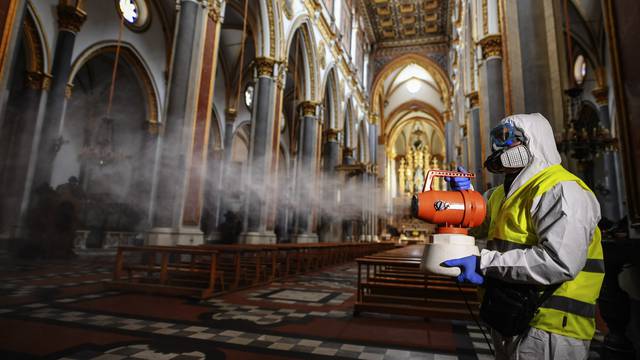 Sanitary workers  disinfect the church of San Domenico
