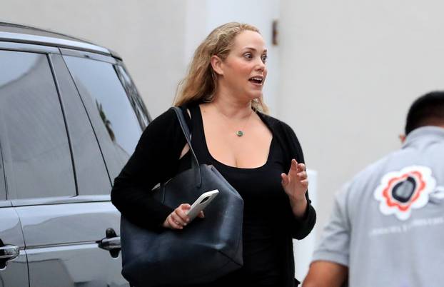 *EXCLUSIVE* Elizabeth Berkley gets her shopping on at the Emporio Armani store in Bev Hills