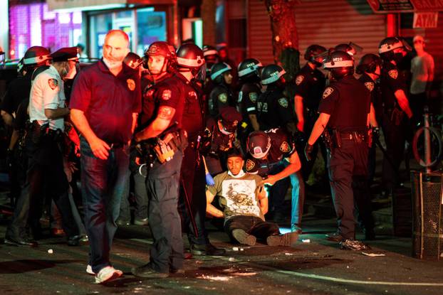 Protesters rally against the death in Minneapolis police custody of Floyd, in the Brooklyn borough of New York City