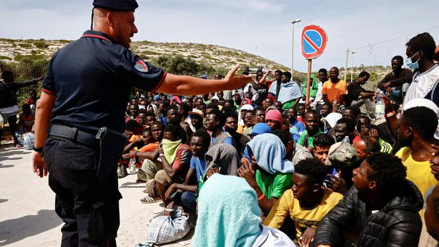 FILE PHOTO: Migrants in Lampedusa