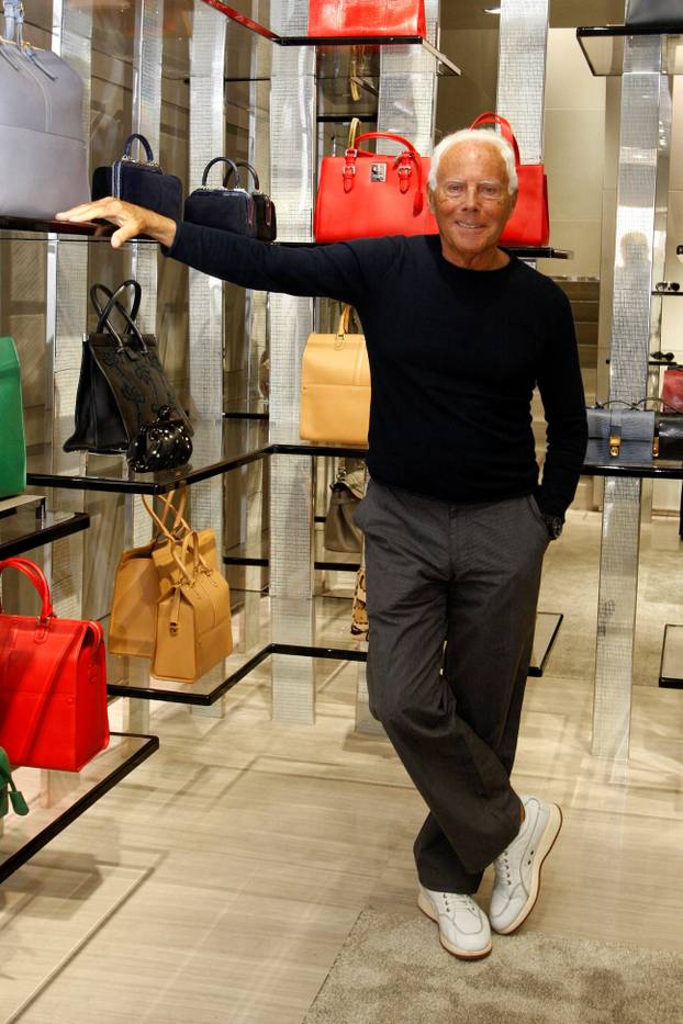 FILE PHOTO: Giorgio Armani poses inside his boutique in Rome, Italy