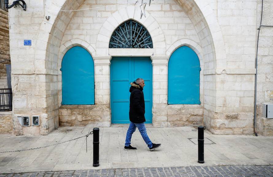 FOTO Betlehemske ulice puste, tek malobrojni zapjevali pjesme