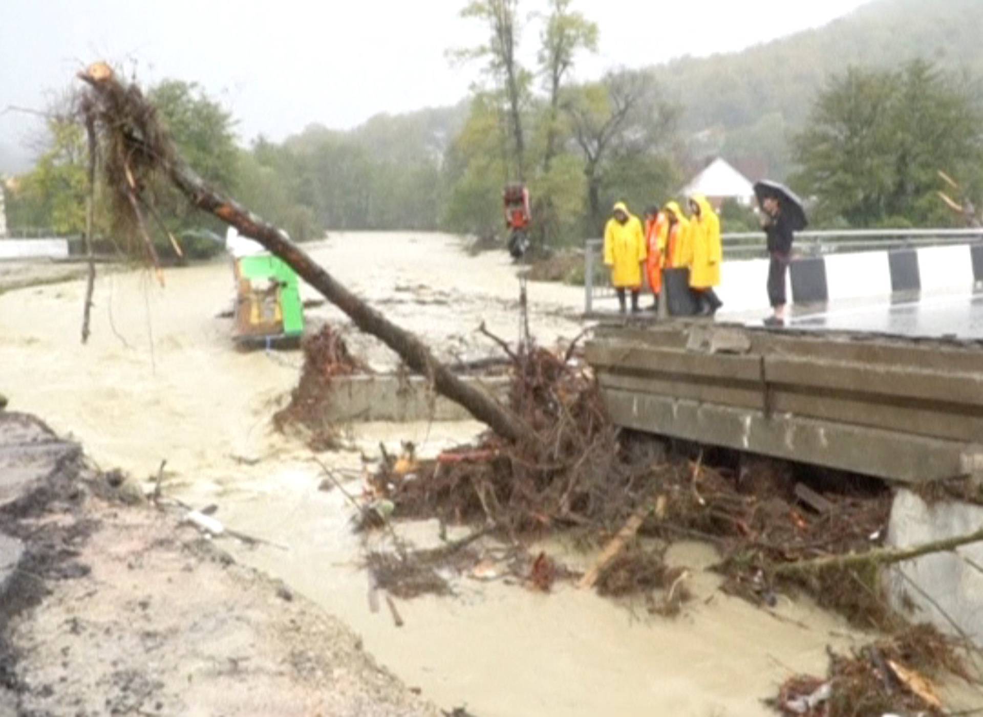 A still image shows a bridge damaged by floodwaters in Krasnodar Region