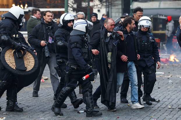 Farmers rally in a large-scale protest in Brussels as leaders meet in EU summit