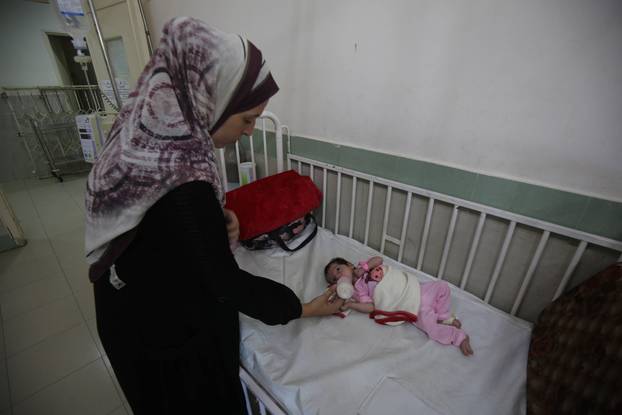 Palestinian children suffering from malnutrition receive medical care at Al-Rantisi Children's Hospital
