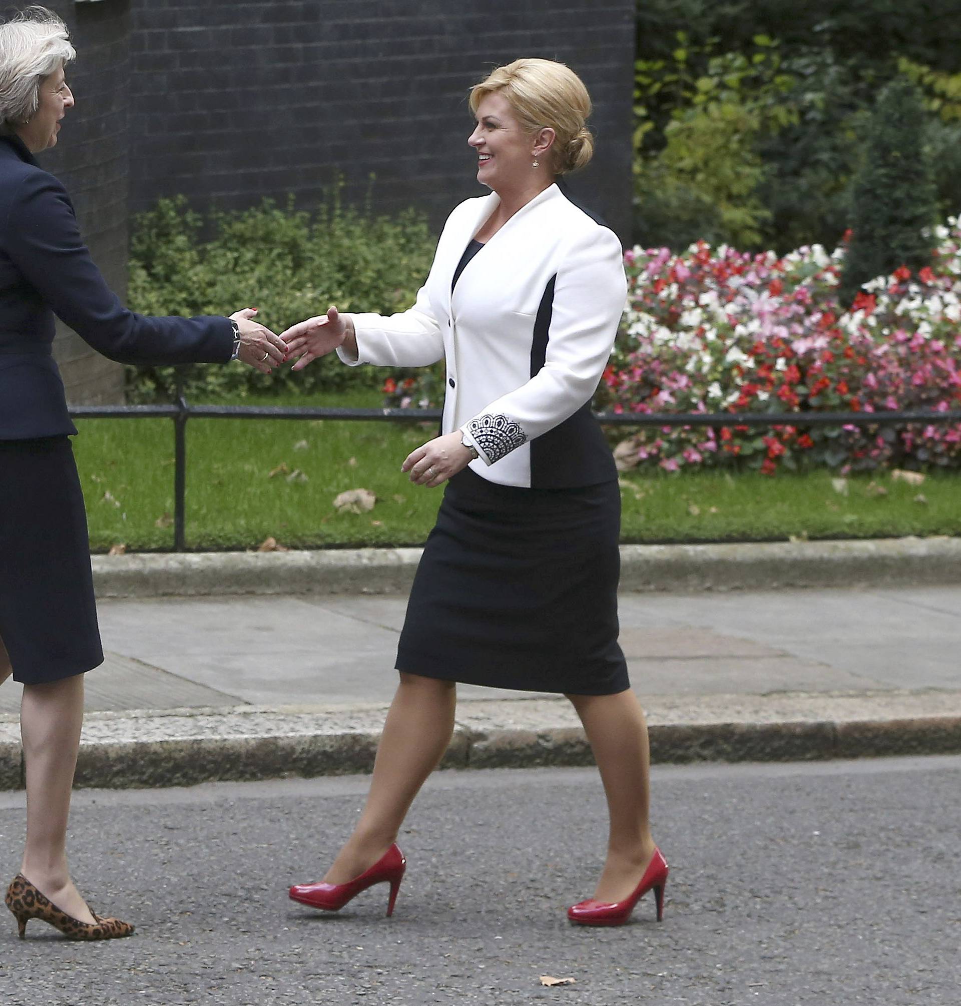 Britain's Prime Minister Theresa May greets Croatia's President Kolinda Grabar-Kitarovic at Downing Street in London