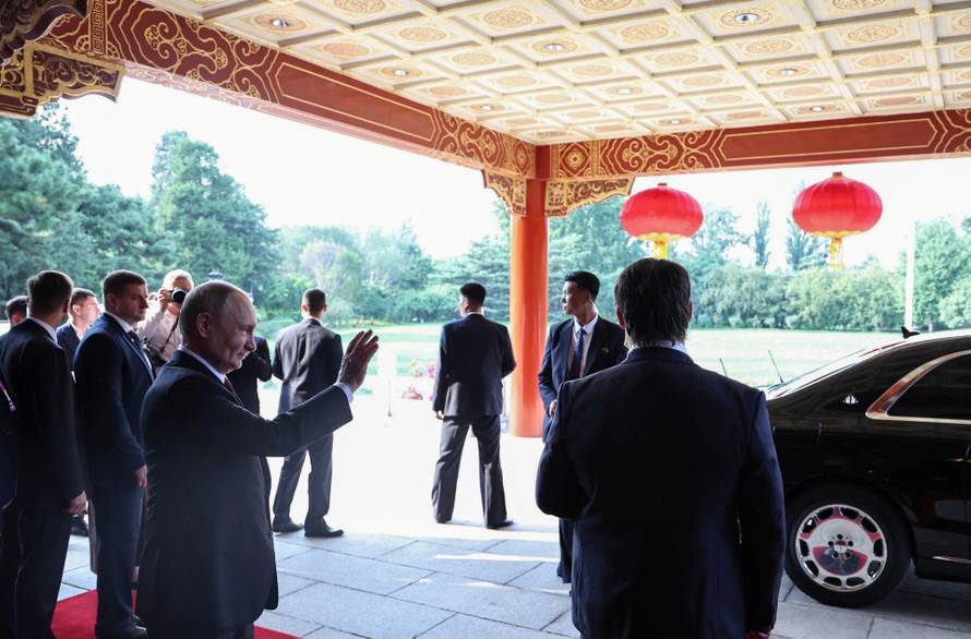 Russian President Vladimir Putin meets with North Korean leader Kim Jong Un in Beijing