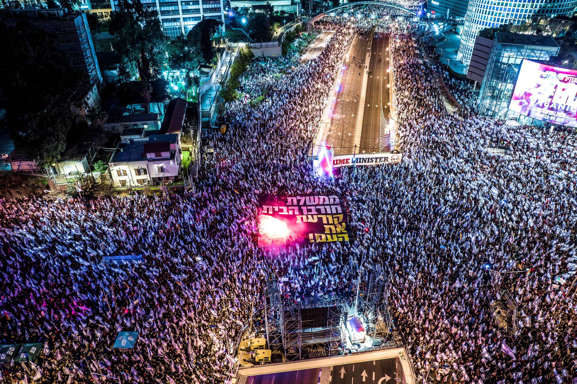 FILE PHOTO: An aerial view shows Israelis protesting, as Israeli Prime Minister Benjamin Netanyahu's nationalist coalition government presses on with its judicial overhaul, in Tel Aviv