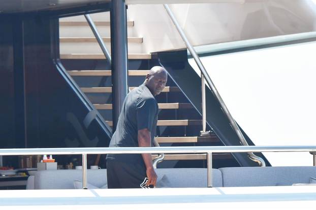*EXCLUSIVE* WEB MUST CALL FOR PRICING  - Michael Jordan aboard his Yacht "M'BRACE" and smoking his trademark cigar out in Venice.