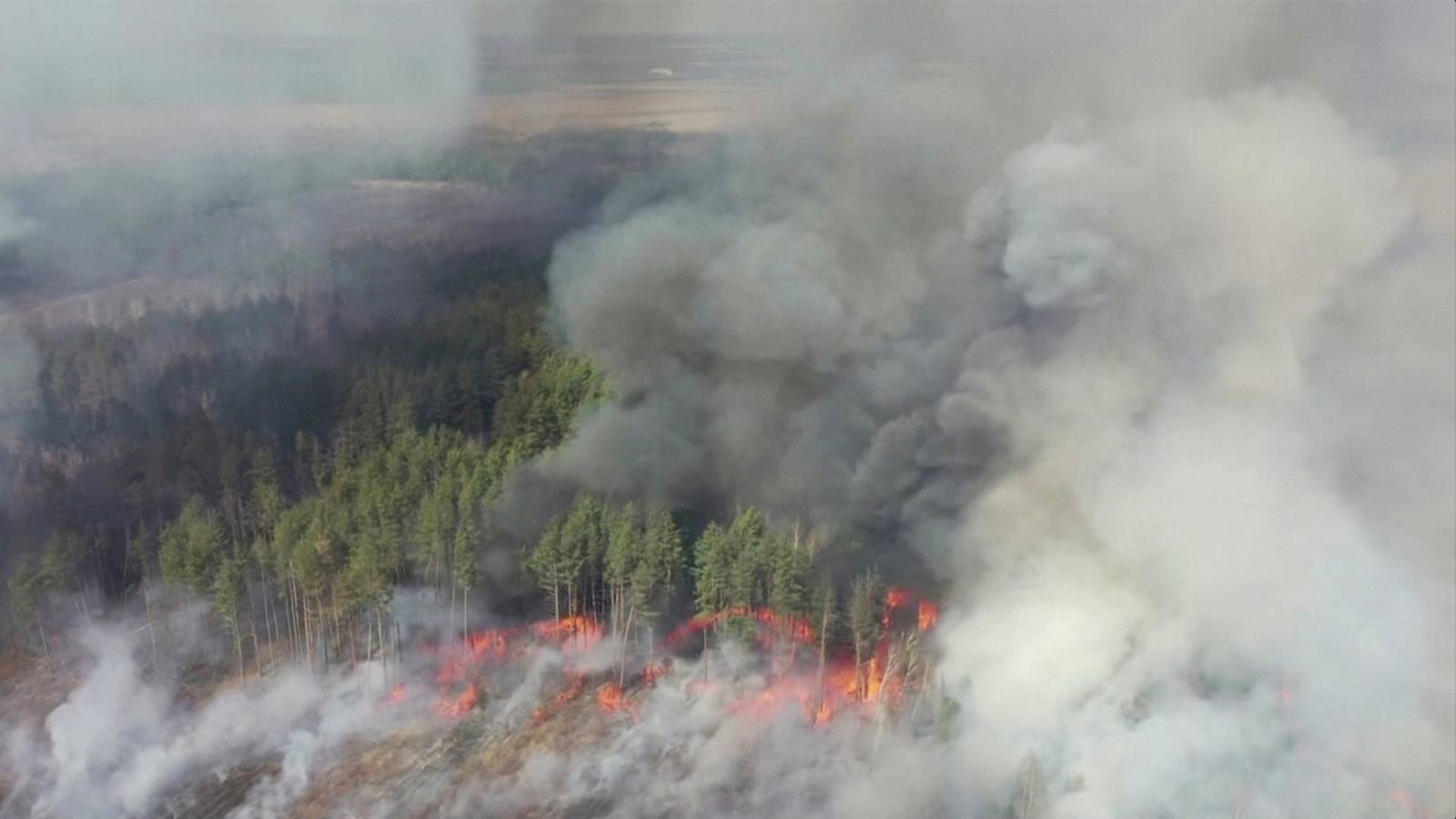 An aerial view shows a forest fire in the exclusion zone around the Chernobyl nuclear power plant