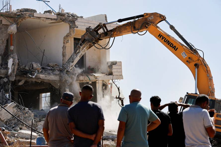 Israeli heavy machinery demolition of a Palestinian building near Hebron