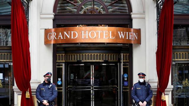 FILE PHOTO: Police stand outside a hotel where a meeting of the Joint Commission of the Joint Comprehensive Plan of Action (JCPOA), or Iran nuclear deal, is held in Vienna, Austria,