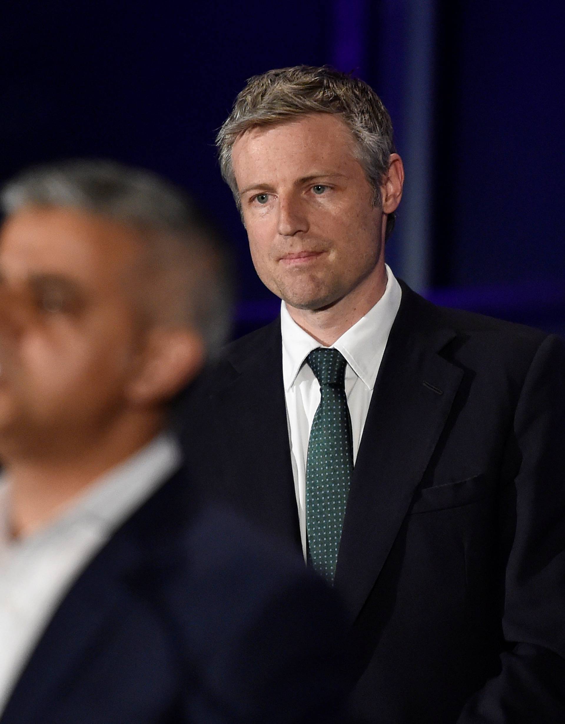 Candidates for Mayor of London Goldsmith and Golding react as fellow candidate Khan speaks following his victory in London 