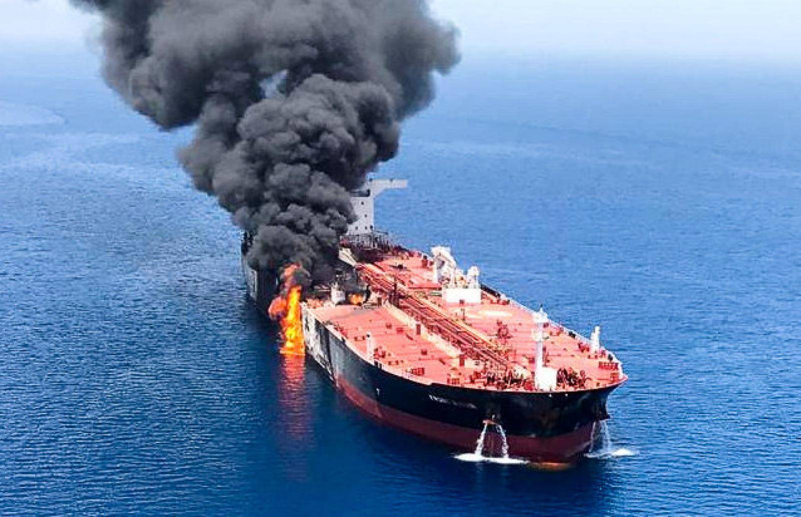 An oil tanker is seen after it was attacked at the Gulf of Oman