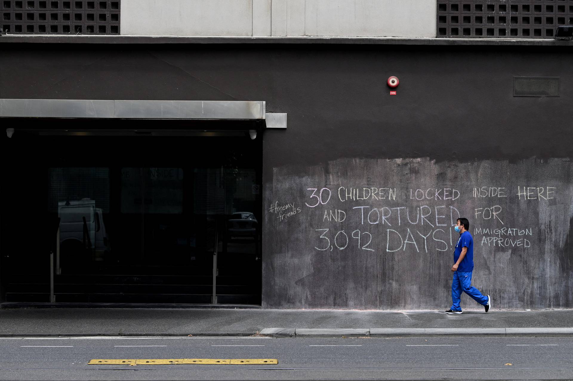 A sign written in chalk is seen at the Park Hotel, believed to be holding Novak Djokovic of Serbia in Melbourne