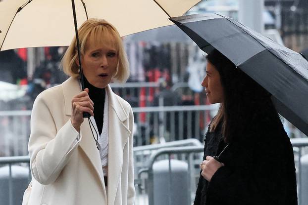 E. Jean Carroll walks outside the Manhattan Federal Court, in  New York City