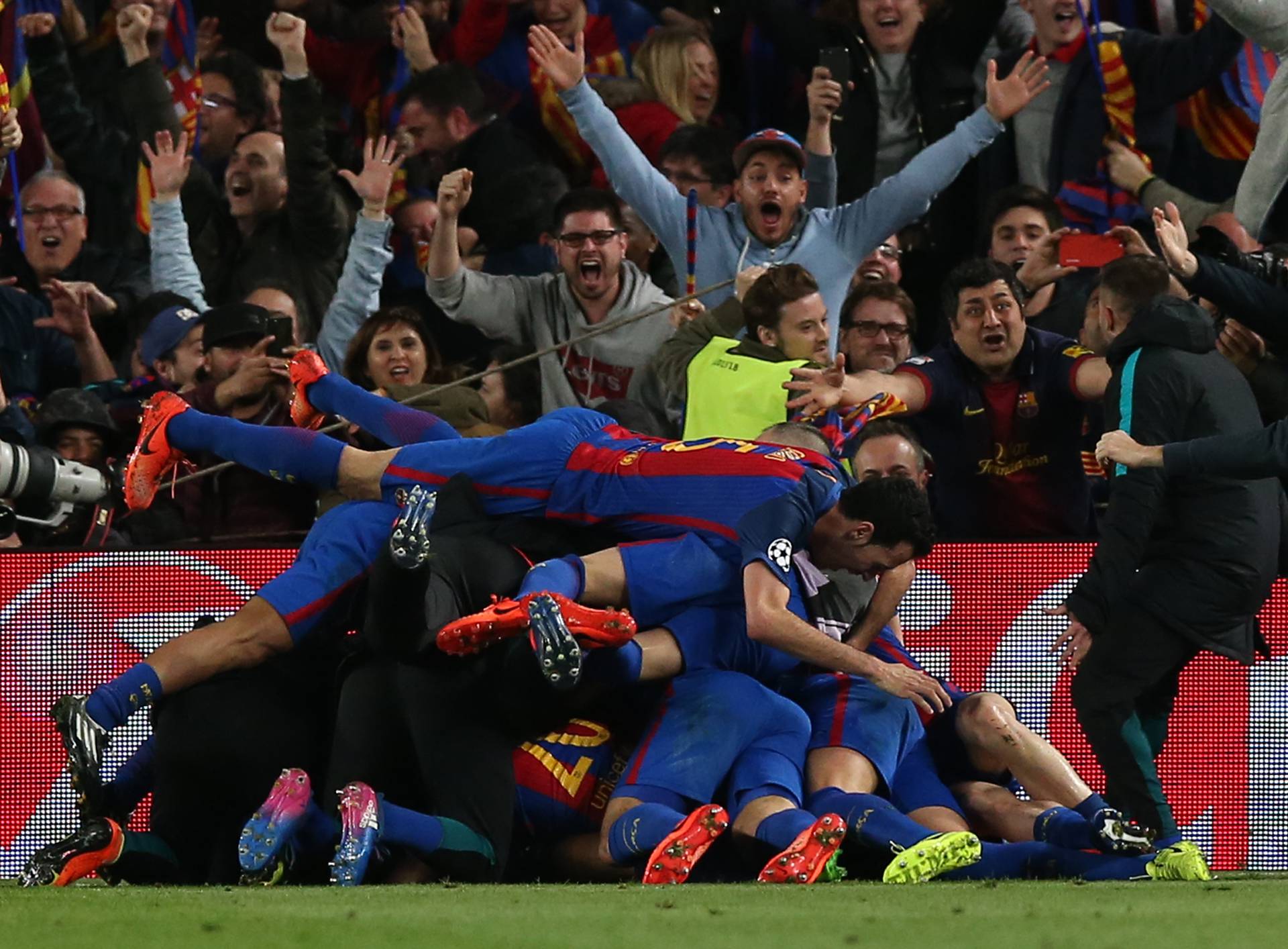 Barcelona's Sergi Roberto celebrates scoring their sixth goal with team mates