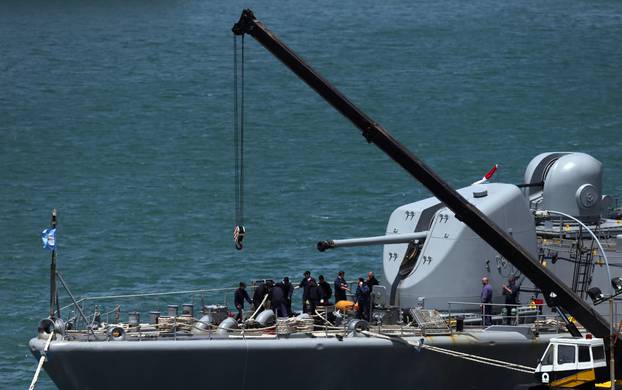 Navy crew work aboard the ARA Sarandi destroyer before leaving to take part in the search for the ARA San Juan submarine missing at sea at the Argentine Naval Base in Mar del Plata