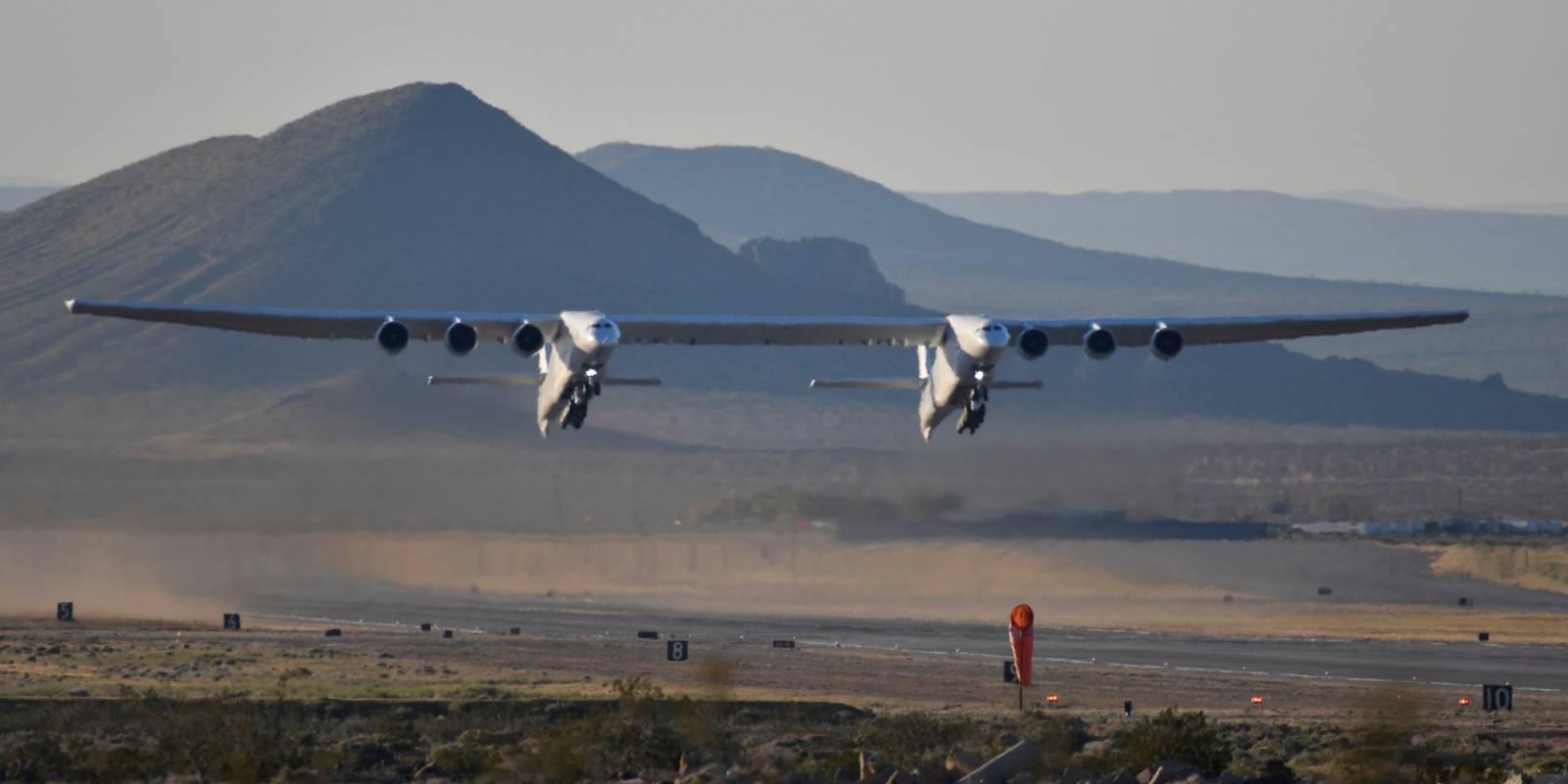 The world's largest airplane, built by the late Paul Allen's company Stratolaunch, makes its first test flight in Mojave