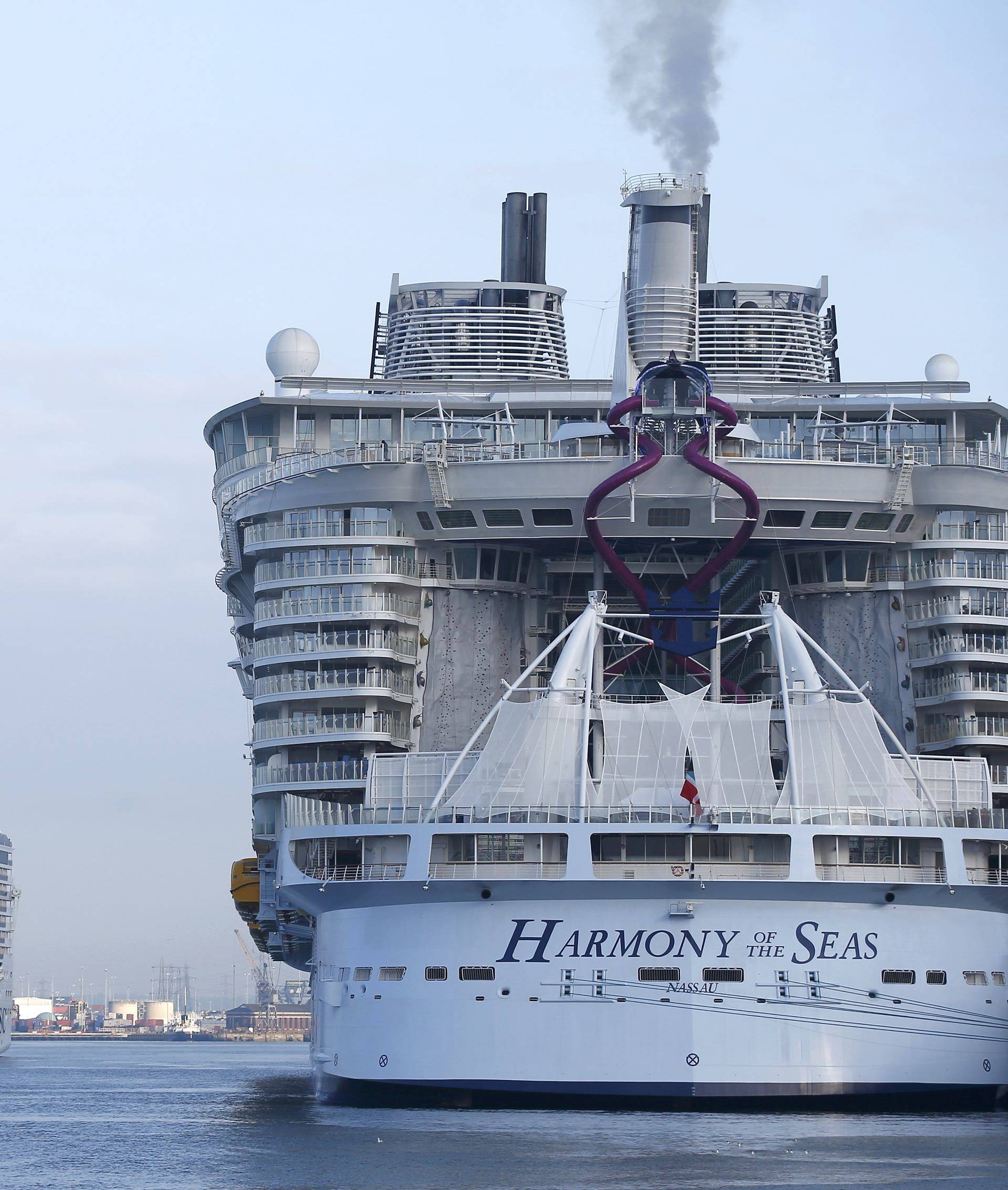 The worlds largest cruise ship, the 361 metres long, Harmony of the Seas (R), moored at its' berth as cruise ship MSC Splendida (L), sails into port alongside it in Southampton