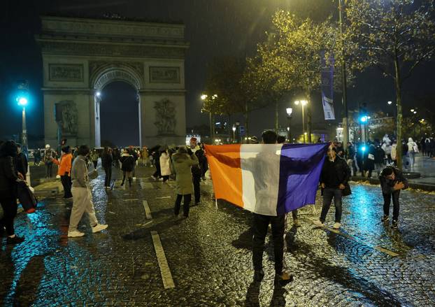 FIFA World Cup Final Qatar 2022 - France fans react on the Champs-Elysees during the final between France and Argentina
